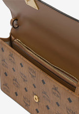 MCM Large Aren Monogram Clutch Bag Cognac MYLFATA01COGNAC_92fde91b-35bd-4cc0-a14e-3a954d045ab9
