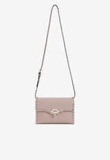 Small Rockstud Grained Leather Crossbody Bag