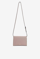 Small Rockstud Grained Leather Crossbody Bag