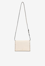 Small Rockstud Grained Leather Crossbody Bag