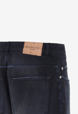 Curved-Knee Faded Jeans
