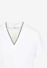 توب قصير الأكمام بقَصة عنق V