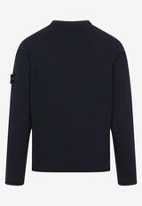 كنزة برقبة دائرية مع رقعة شعار الماركة