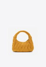 Wander Quilted Leather Top Handle Bag