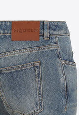 جينز واسع من الأسفل بتأثير باهت