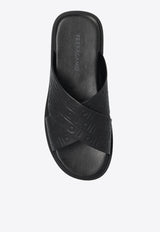Monogram-Embossed Leather Slides