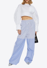 بنطال مُقلّم بقَصة ساق واسعة