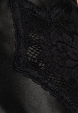 فستان مخصر من الدانتيل بلا أكمام بطول منتصف الساق