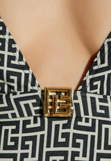 بدلة سباحة بحمالات عنق وشعار الماركة