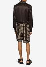 Dolce & Gabbana Coin Print Bermuda Shorts in Silk GW0MAT HI1LR HM4RL Multicolor