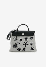 Hermès Herbag Zip Retourne 31 Circuit Rider Hobnailed in Black and Ecru H Plume Canvas with Palladium Hardware