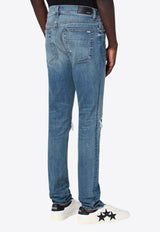 Amiri Slim-Leg Ripped Jeans Blue PXMD001CO/R_AMIRI-950