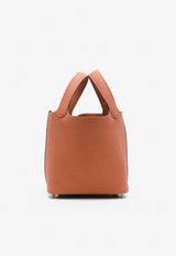 حقيبة بيكوتين لوك 18 من جلد التوريلون كليمنس بلون كويفر مع أجزاء معدنية ذهبية