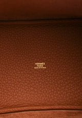 حقيبة بيكوتين لوك 18 من جلد التوريلون كليمنس بلون كويفر مع أجزاء معدنية ذهبية