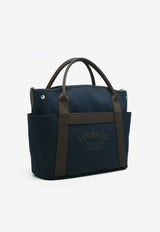The Grooming Bag in Bleu Navy Canvas and Feu Barenia Leather