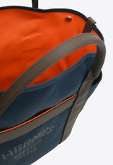 The Grooming Bag in Bleu Navy Canvas and Feu Barenia Leather