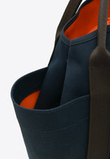 The Grooming Bag in Bleu Navy Canvas and Feu Barenia Leather