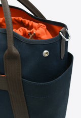 The Grooming Bag in Bleu Navy Canvas and Feu Barenia Leather