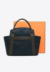 The Grooming Bag in Bleu Navy Canvas and Feu Barenia Leather
