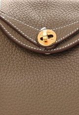 حقيبة ميني ليندي 20 من جلد توريليون كليمنس بلون ايتوب مع أجزاء معدنية ذهبية