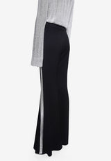 بنطال لوف دولز واسع من الأسفل