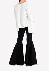 توب بروتوس بأكمام واسعة من الأسفل