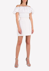 توب قصير بأكتاف متدلية وأكمام منفوخة