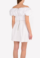 توب قصير بأكتاف متدلية وأكمام منفوخة