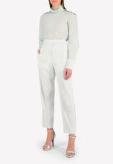 توب من الحرير بياقة مكشكشة وأكمام منفوخة