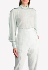 توب من الحرير بياقة مكشكشة وأكمام منفوخة