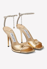 Jimmy Choo Saeda 100 Metallic Sandals with Crystal Chain Gold SAEDA SANDAL 100 BAQ GOLD/CRYSTAL HONEY