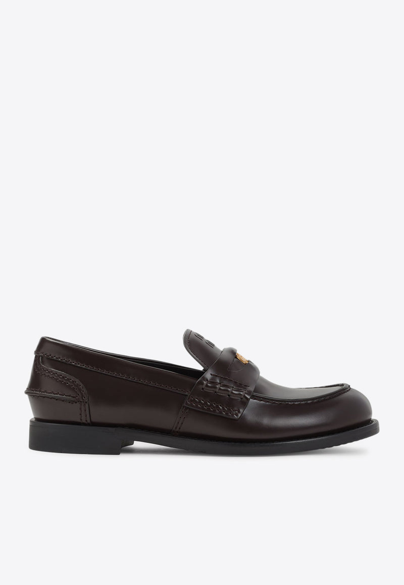 Embossed Logo Penny Loafers in Brushed Leather