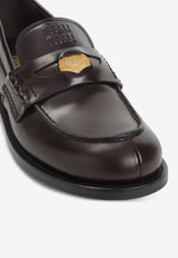 Embossed Logo Penny Loafers in Brushed Leather