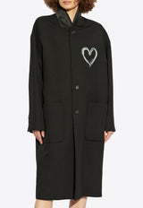 Coat with heart-shaped print