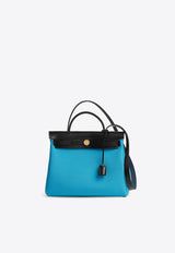 Herbag 31 in Gentiane Toile H and Black Vache Hunter with Gold Hardware