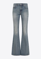 جينز واسع من الأسفل بتأثير باهت