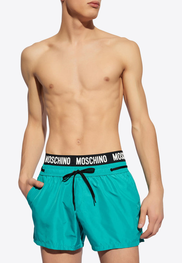 Moschino Logo Waistband Swim Shorts Blue KĄPIELOWE 241V3 A4222 9301-0366