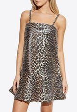 فستان قصير من الدنيم بنقشة جلد الفهد