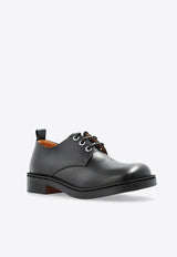 Skull-Embossed Leather Derby Shoes