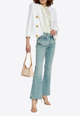 جينز واسع من الأسفل بشعار مُطرّز