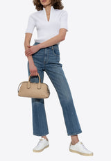 توب مُضلع بياقة عالية