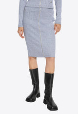 تنورة بحبكة مُضلّعة بطول منتصف الساق بسحّاب