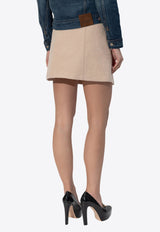 تنورة قصيرة من نسيج البوكليه بقَصة مُتدرجة