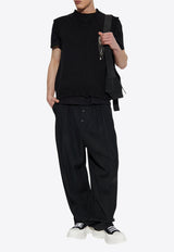 كنزة محبوكة بلا أكمام بتأثير مُمزق