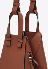 Loewe Logo-Embossed Compact Hammock Leather Bag  A538H13X10LE/O_LOEW-2530