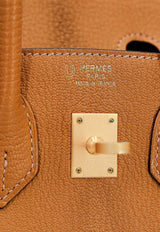 Birkin 25 Verso in Caramel and Jaune Ambre Chevre Leather with Brushed Gold Hardware