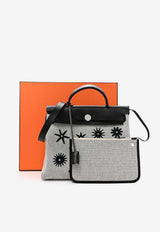 Hermès Herbag Zip Retourne 31 Circuit Rider Hobnailed in Black and Ecru H Plume Canvas with Palladium Hardware