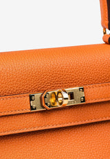 Kelly 25 in Orange Togo with Gold Hardware