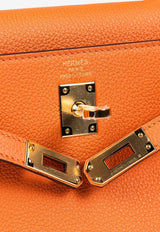Kelly 25 in Orange Togo with Gold Hardware