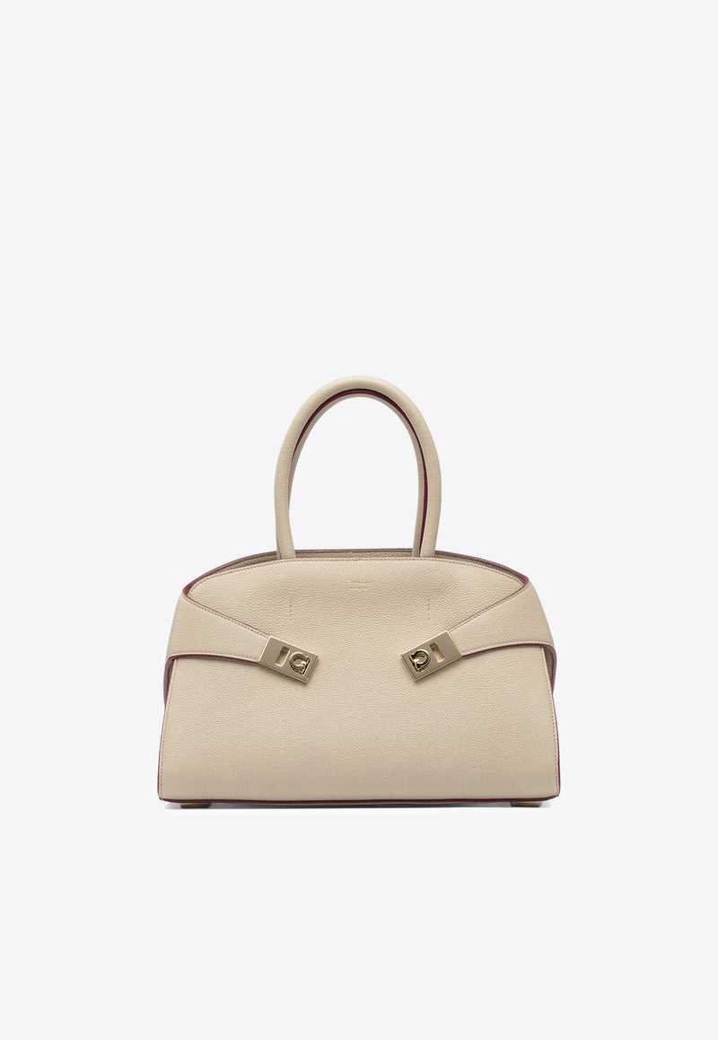 Ferragamo Medium Hug Leather Top Handle Bag Beige 0779053_40471bc0-817e-422a-9958-49fa3e85af94
